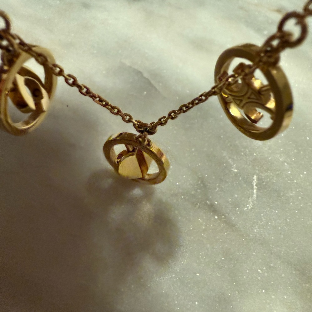 Celine Swivel Multi-Pendant Bracelet - Picture 9 of 11